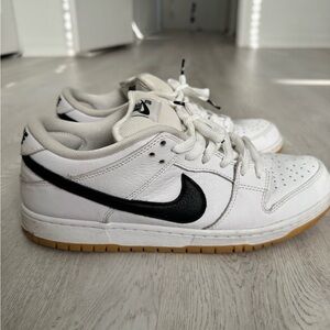 Nike Dunk Low White and Black Sneakers with “white gum”